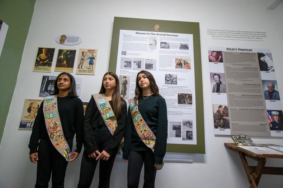Girls Scouts of the Jersey Shore Cadette Troop 177 members Mahi Shah, Julia Calamia and Giuliana Demma, all 13-years-old of Freehold Twp., talk about earning their Silver Award by curating an exhibit which traces the history of women at Fort Monmouth and Camp Evans at the InfoAge Science and History Museum in Wall, NJ Monday, November 20, 2023.