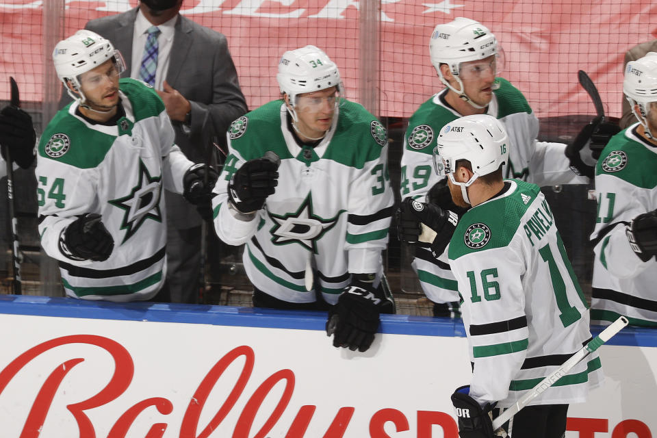 Teammates congratulate Dallas Stars center Joe Pavelski (16) after he scored a goal against the Florida Panthers during the first period of an NHL hockey game, Monday, May 3, 2021, in Sunrise, Fla. (AP Photo/Joel Auerbach)