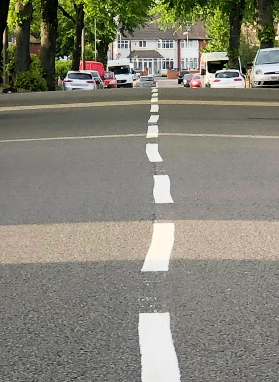 Contractor Amey has apologised to residents after painting wonky white road markings on a city street.  See SWNS story SWMDlines.  Locals were left scratching their heads after the wobbly lines appeared in Brockhurst Road, Hodge Hill.  As well as the centre lines being out of kilter, workmen had also left paint splatters and faded lines in the road.  After visiting the street on Wednesday Councillor Majid Mahmood (Hodge Hill and Bromford) had demanded the "shoddy" work be redone.