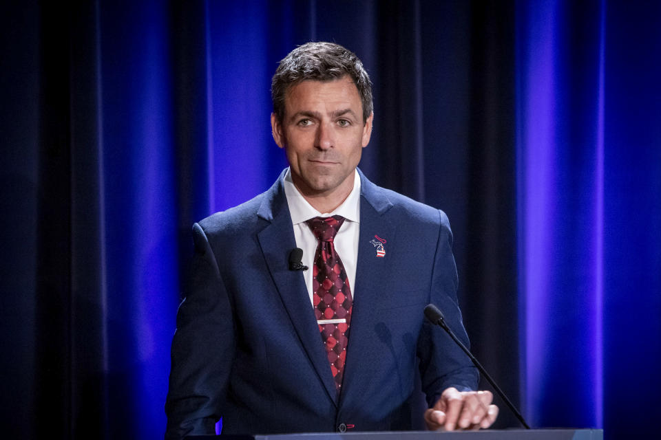 FILE - Michigan Republican candidate for governor Ryan Kelley, of Allendale, appears at a debate in Grand Rapids, Mich., July 6, 2022. The Republican primary for Michigan governor is shaping up as a battle of whose personal baggage is the least disqualifying.(Michael Buck/WOOD TV8 via AP, FIle)