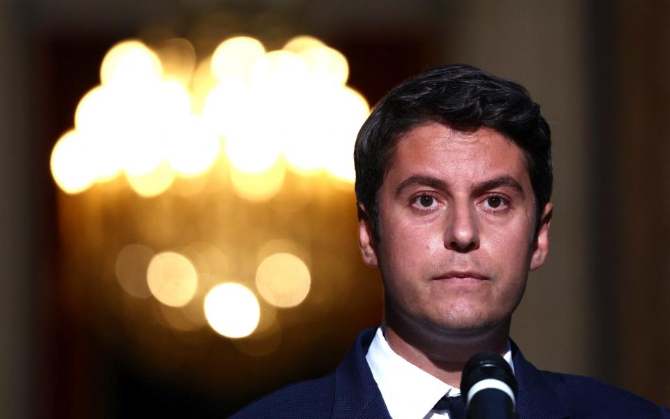 Gabriel Attal, French Prime Minister and French presidential majority group "Ensemble pour la Republique" candidate, delivers a speech after partial results in the first round of the early French parliamentary elections, at Hotel Matignon in Paris, France, June 30, 2024. REUTERS/Yara Nardi