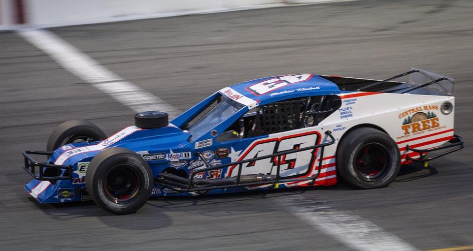 Matthew Kimball, driver of the #43 J&M Towing, Poodiack Wealth Managment, Post & Beam, Edmund Ace Hardware, Trends of Fashion, during qualifying for the New Smyrna Beach Visitors Bureau 200 for the NASCAR Whelen Modified Tour during night 2 of the World Series of Asphalt Stock Car Racing at New Smyrna Speedway in New Smyrna, Florida on February 11, 2023. (Adam Glanzman/NASCAR)