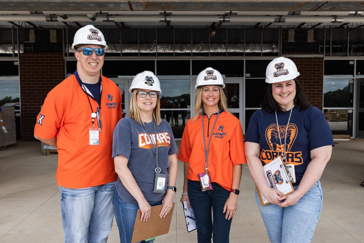 Kirkwood High School assistant principal Joshua Stoeckl , principal Jessica Peppard, assistant principals Stacy Maley and Brandy Walker stand in front of the new school doors.