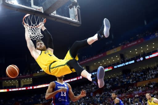 Andrew Bogut was booed by Chinese fans during Australia's victory over the Dominican Republic after his barbed comment about national swimming hero Sun Yang