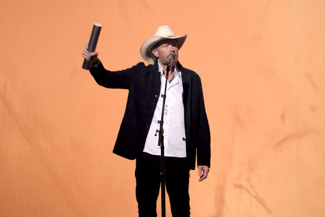 <p>Allen Clark/NBC via Getty</p> Toby Keith accepts the country icon award on stage during the 2023 People's Choice Country Awards held at the Grand Ole Opry on Sept. 28, 2023 in Nashville