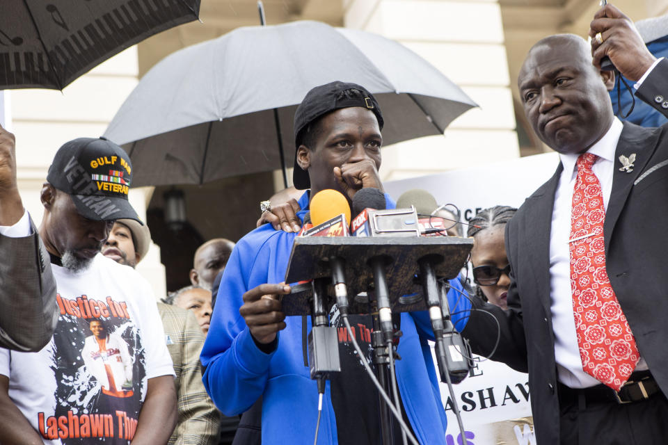 Brad McCrae, brother of Lashawn Thompson, sheds a tear while speaking at a press conference addressing the results of an independent autopsy determining the cause of death of Thompson on Monday, May 22, 2023, at the State Capital in Atlanta. Thompson's family and legal team released the results of an autopsy that determined that his death in the psychiatric wing of the Fulton County Jail resulted from neglect. (Christina Matacotta /Atlanta Journal-Constitution via AP)