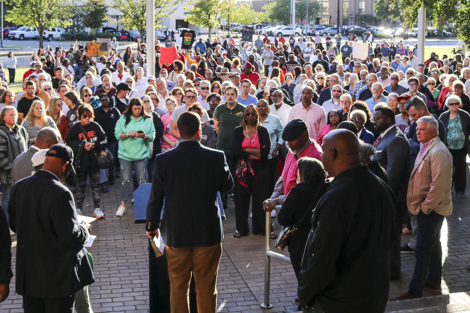 Hundreds attend a community prayer service at Decatur, Ala,. City Hall on Sunday, Oct. 8, 2023, that was partially disrupted by a few people protesting the Sept. 29 police shooting of Steve Perkins.