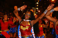 <p>A group of ladies dressed as Wonder Woman dance in the streets at the 44th annual Village Halloween Parade in New York City on Oct. 31, 2017. (Photo: Gordon Donovan/Yahoo News) </p>