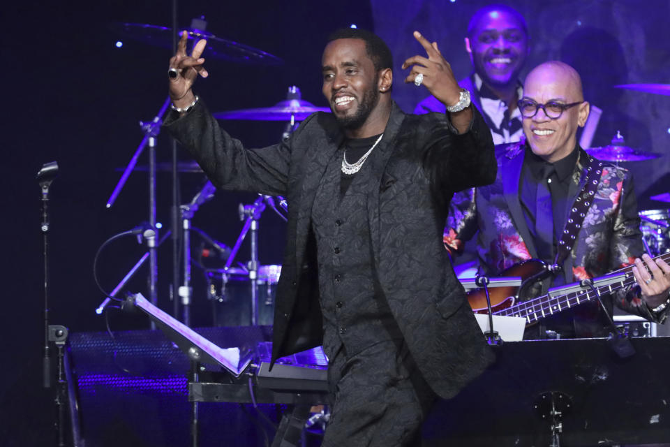 Sean Combs walks on stage to accept the 2020 Industry Icon award at the Pre-Grammy Gala And Salute To Industry Icons at the Beverly Hilton Hotel on Saturday, Jan. 25, 2020, in Beverly Hills, Calif. (Photo by Willy Sanjuan/Invision/AP)