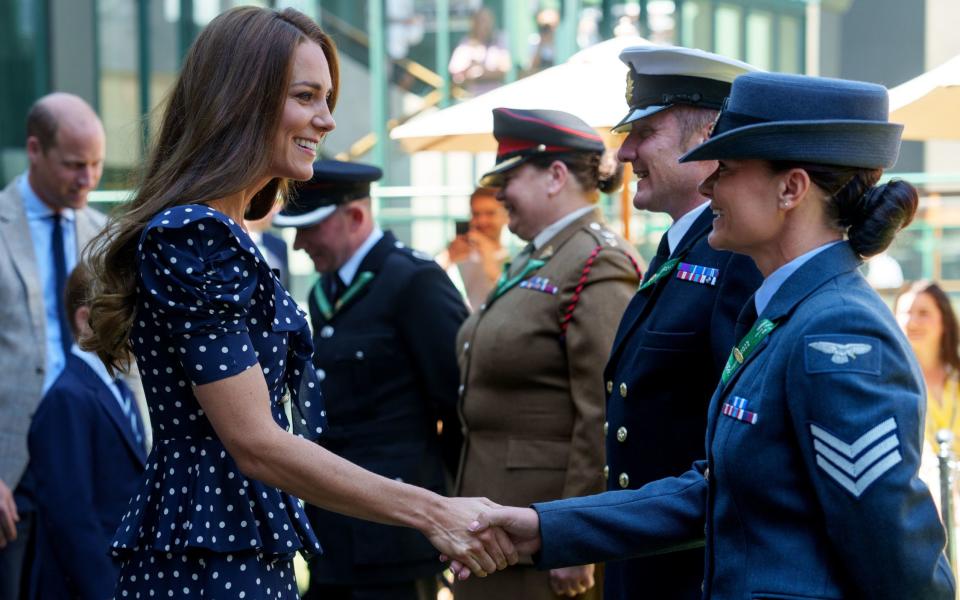 The Duchess of Cambridge meeting a group of military personnel who are working as stewards at Wimbledon - Thomas Lovelock/AELTC/PA wire