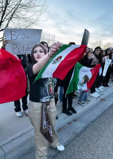 Brenda Hernandez waves a Mexican flag at the day of the protest on Jan. 17.  (Courtesy Brenda Hernandez)