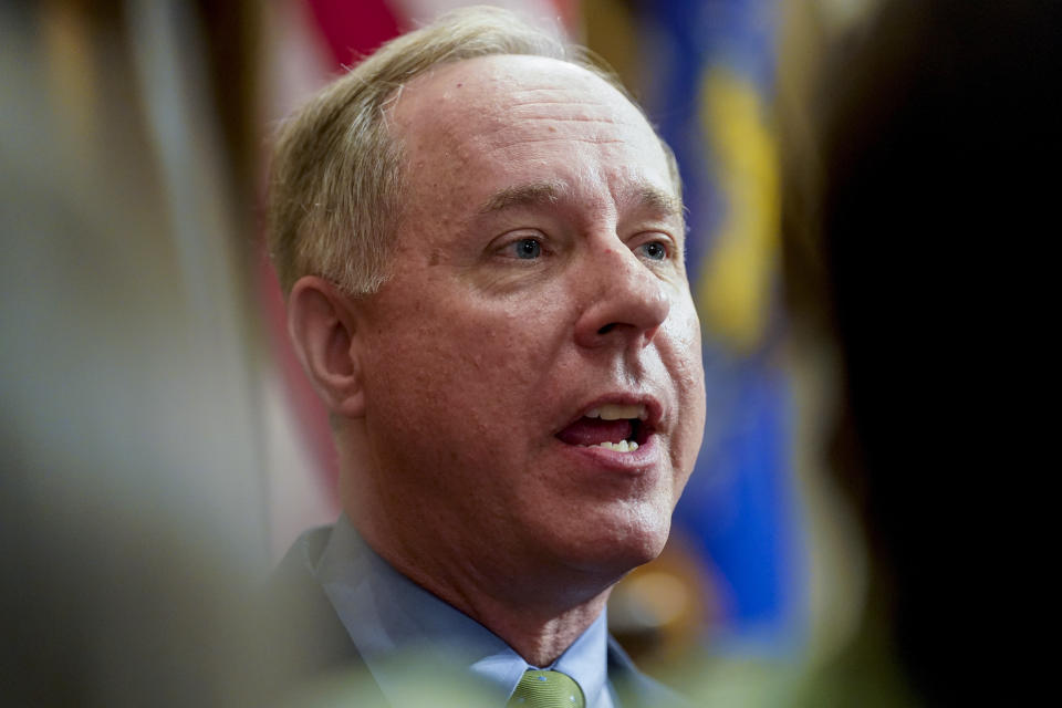 FILE - Wisconsin Assembly Speaker Robin Vos talks to the media after Gov. Tony Evers addressed a joint session of the Legislature in the Assembly chambers during the governor's State of the State speech at the state Capitol Tuesday, Feb. 15, 2022, in Madison, Wis. On Friday, April 15, 2022, the Wisconsin Supreme Court adopted Republican-drawn maps for the state Legislature, after initially approving maps drawn by Democratic Wisconsin Gov. Tony Evers. Vos tweeted praise for the ruling, saying Republicans “have thought our maps were the best option from the beginning.” (AP Photo/Andy Manis)