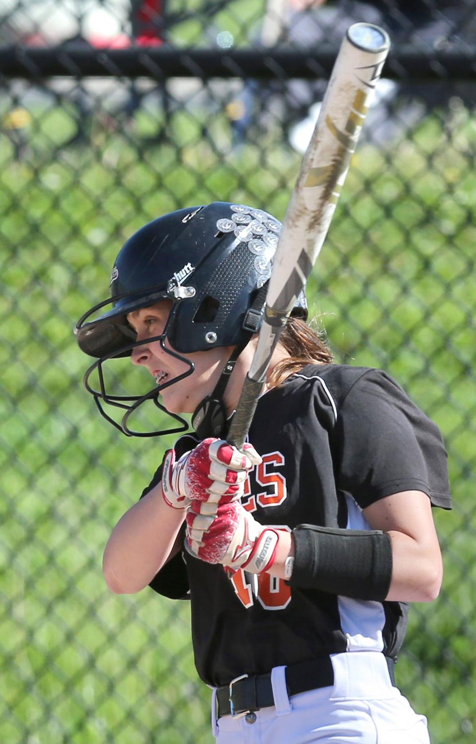 Faith Savage of Marlington singles and drives in a run during their DII district semifinal against ND-CL at Hubbard on Tuesday, May 17, 2022.