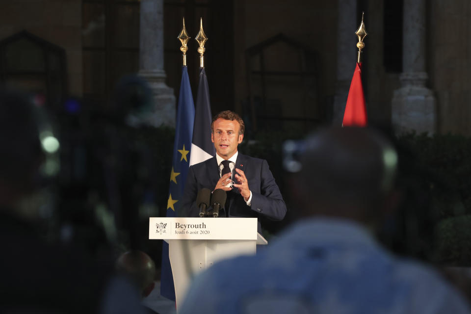 French President Emmanuel Macron delivers his speech during a press conference in Beirut, Lebanon, Thursday Aug.6, 2020. The blast, which killed more than 130 people, wounded thousands and left tens of thousands homeless, is believed to have been caused when a fire touched off a stockpile of 2,750 tons of highly explosive ammonium nitrate. French President Emmanuel Macron announced that France will organize a conference in the next few days with European, American, Middle Eastern and other donors to raise money for food, medicine, housing and other urgent aid. (AP Photo/Thibault Camus, Pool)