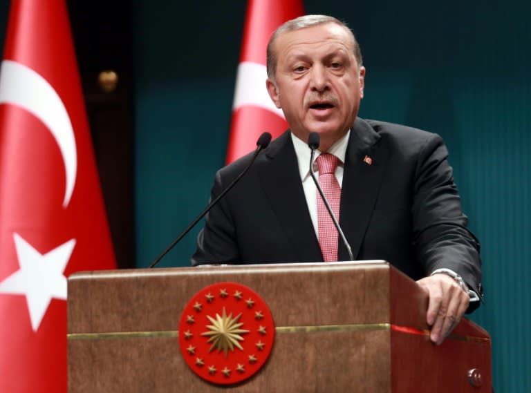 Turkish President Tayyip Erdogan speaks during a news conference following the National Security Council and cabinet meetings, at the Presidential Palace in Ankara, on July 21, 2016