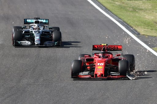 Charles Leclerc's front wing was damaged and with bits flying off in all directions, one demolishing the wing mirror of Mercedes driver Lewis Hamilton behind him