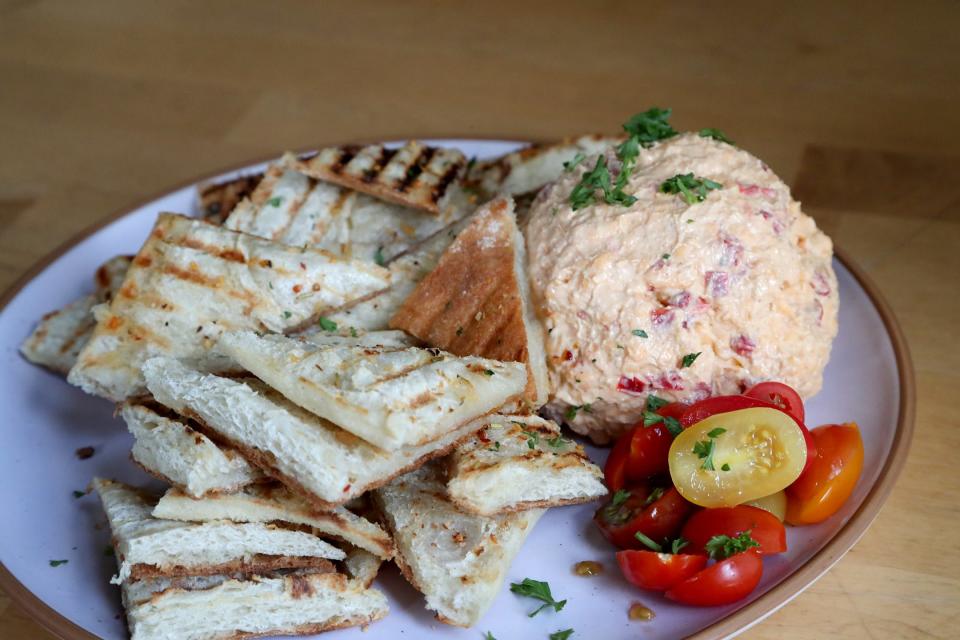 Starland Cafe's Pa's Pimento plate is their farm-style hand-ground pimento cheese, served with grilled ciabatta bread.
