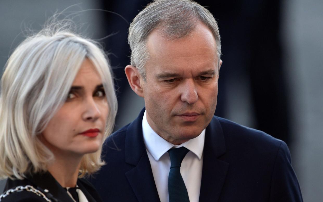 Francois de Rugy, seen here with his wife, French journalist Severine Servat, was criticised for his use of public funds - AFP