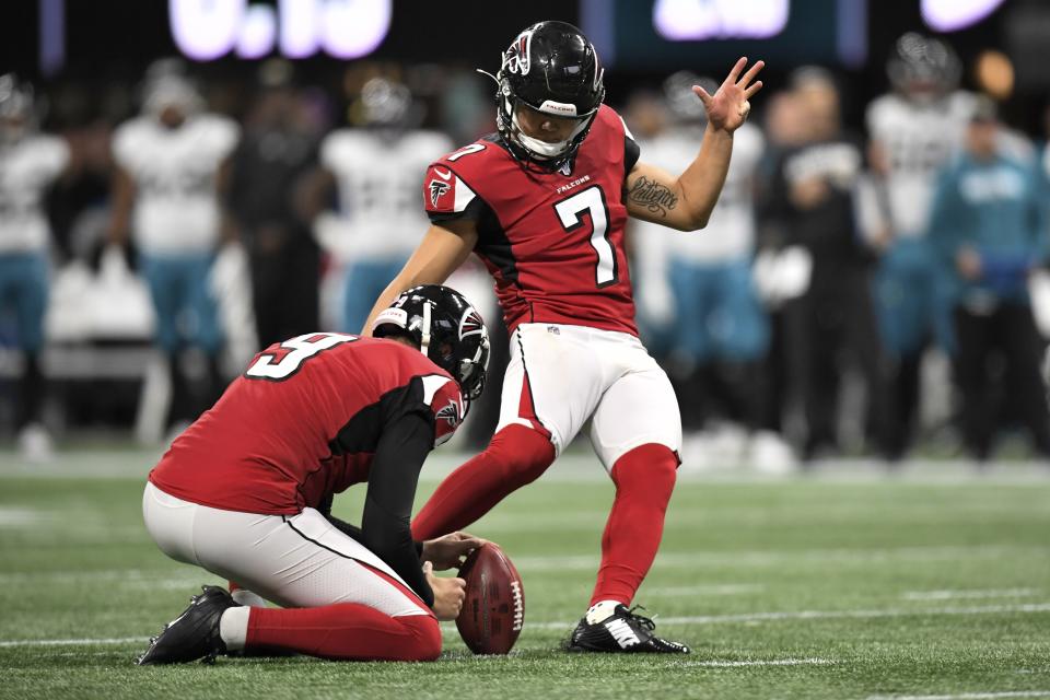 Atlanta Falcons kicker Younghoe Koo (7) works against the Jacksonville Jaguars during the first half of an NFL football game, Sunday, Dec. 22, 2019, in Atlanta. (AP Photo/Danny Karnik)