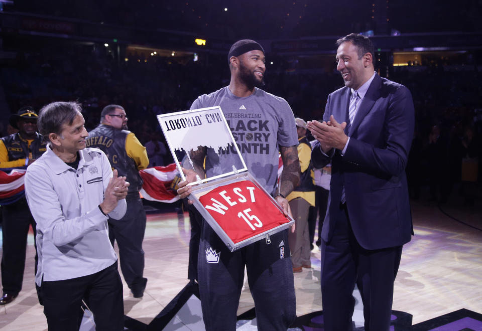 Sacramento Kings center DeMarcus Cousins, Kings majority owner Vivek Ranadive, and Vlade Divac