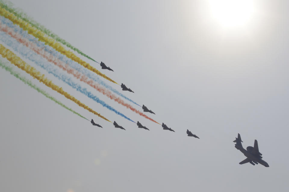 Military aircraft fly in formation over Tiananmen Square during the military parade marking the 70th founding anniversary of People's Republic of China, on its National Day in Beijing, China October 1, 2019. (Photo: Jason Lee/Reuters)