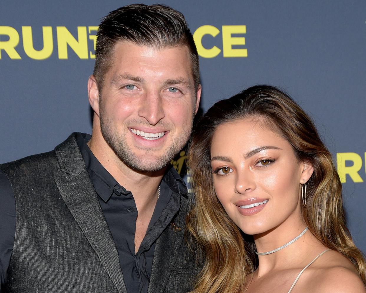 Tim Tebow and Demi-Leigh Nel-Peters attend the premiere of Roadside Attractions' "Run The Race" at the Egyptian Theatre on February 11, 2019 in Hollywood, California