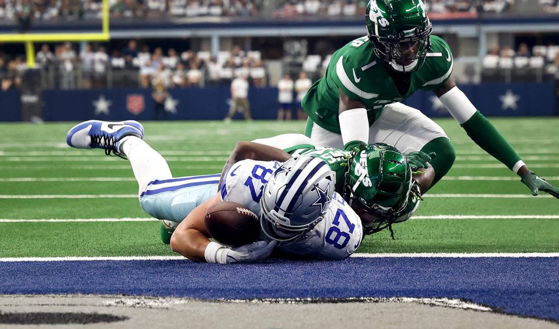 Dallas Cowboys tight end Jake Ferguson scores a touchdown in the first quarter against the New York Jets on Sunday, September 17, 2023, at AT&T Stadium in Arlington.