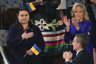 Ukraine Ambassador to the United States, Oksana Markarova, acknowledges President Joe Biden as first lady Jill Biden applauds during his first State of the Union address to a joint session of Congress, at the Capitol in Washington, Tuesday, March 1, 2022. Patrick Gelsinger, CEO of Intel, is at front right. (AP Photo/J. Scott Applewhite, Pool)