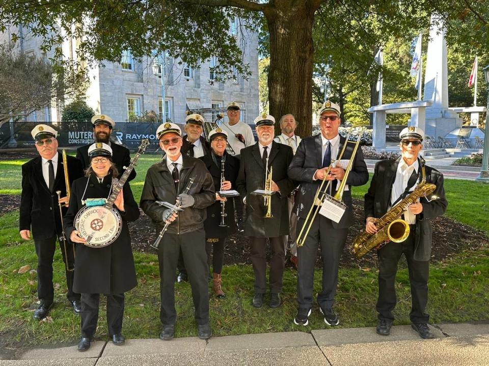 Members of the Oakwood Second Line band, seasoned Raleigh parade participants.