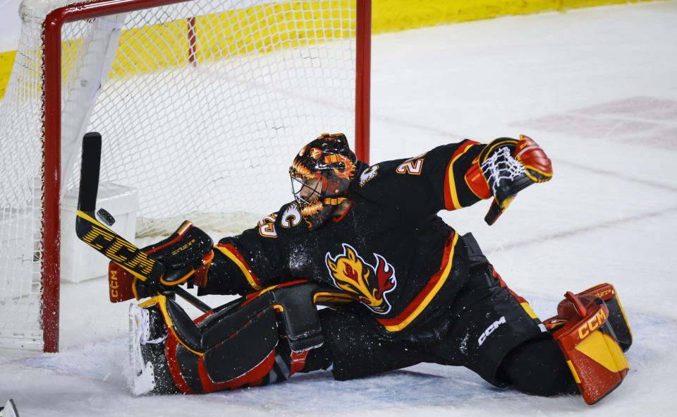 Calgary Flames goalie Jacob Markstrom gives up an overtime goal to the Boston Bruins during an NHL hockey game Tuesday, Feb. 28, 2023, in Calgary, Alberta. (Jeff McIntosh/The Canadian Press via AP)