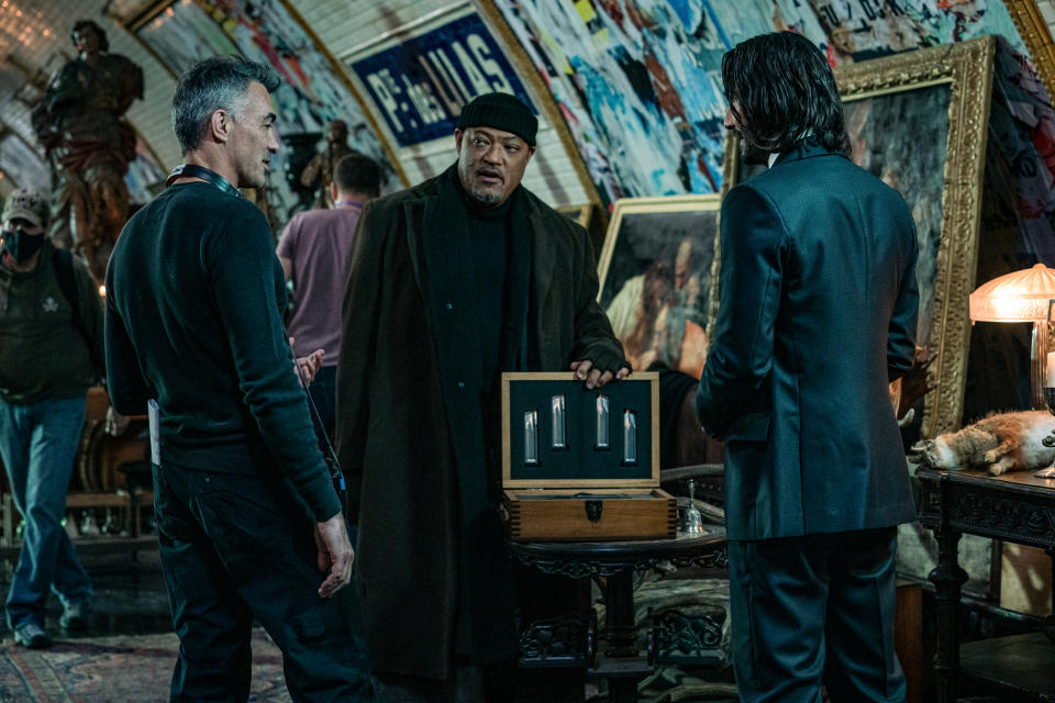 Chad Stahelski - Director, Laurence Fishburne as Bowery King, and Keanu Reeves as John Wick in John Wick: Chapter 4. (Murray Close/Lionsgate)