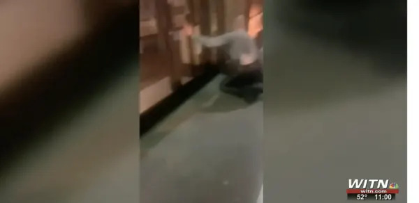 Cellphone video footage shows Washington County Deputy Aaron Edwards jump kicking a handcuffed man with his knee. (Screenshot/WITN)
