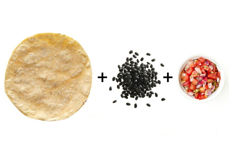 Black beans and salsa on a corn tortilla