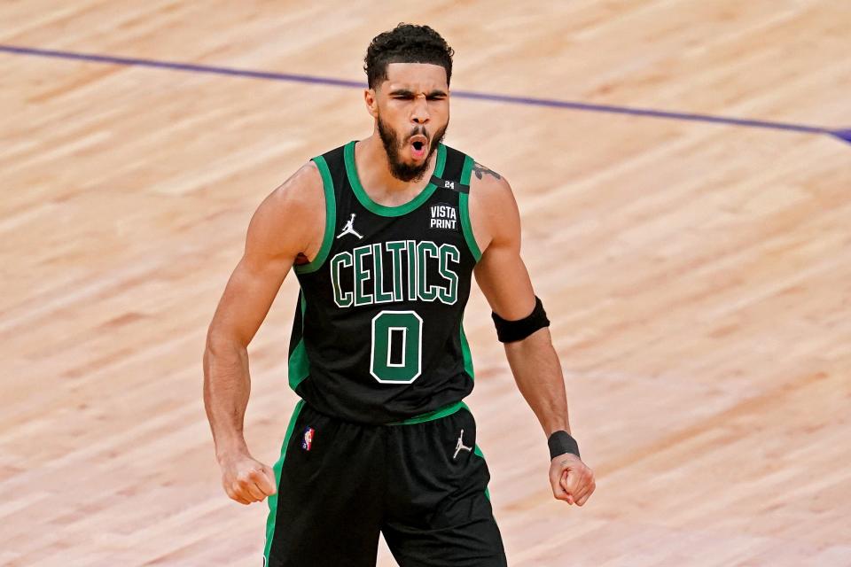 Jayson Tatum gets fired up after a big third-quarter bucket.