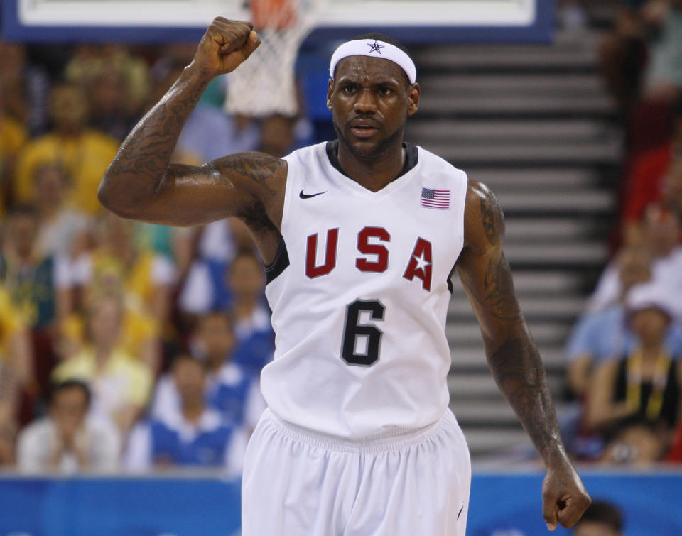 USA's LeBron James celebrates a basket against Australia at the Beijing 2008 Olympic Games, August 20, 2008.    REUTERS/Lucy Nicholson   (CHINA)