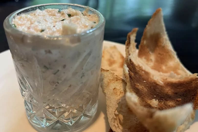 Potted white crab with melba toast