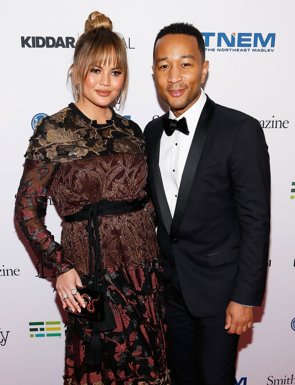 Pregnant Chrissy Teigen has had to flee her home with hubby John Legend, pictured, and daughter Luna. Source: Getty