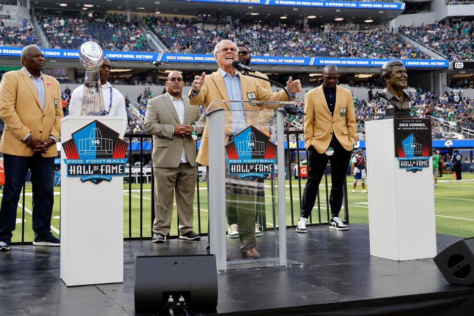 Former NFL coach Dick Vermeil speaks during a NFL Hall of Fame ceremony during halftime of an NFL football game between the Los Angeles Rams and the Philadelphia Eagles Sunday, Oct. 8, 2023, in Inglewood, Calif.