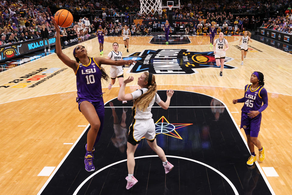 Angel Reese #10 of the LSU Lady Tigers drives to the basket against Molly Davis #1 of the Iowa Hawkeyes during the second half of the 2023 NCAA Women's Basketball Tournament championship game at American Airlines Center in Dallas, Texas, on April 02, 2023.<span class="copyright">Maddie Meyer—Getty Images</span>