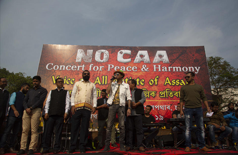 Indian artist Zubeen Garg, center, sings during a protest against the Citizenship Amendment Act in Gauhati, India, Sunday, Dec. 15, 2019. Protests have been continuing over a new law that grants Indian citizenship based on religion and excludes Muslims. (AP Photo/Anupam Nath)