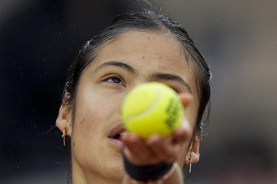 Britain's Emma Raducanu serves against Linda Noskova of the Czech Republic during their first round match at the French Open tennis tournament in Roland Garros stadium in Paris, France, Monday, May 23, 2022. (AP Photo/Michel Euler)