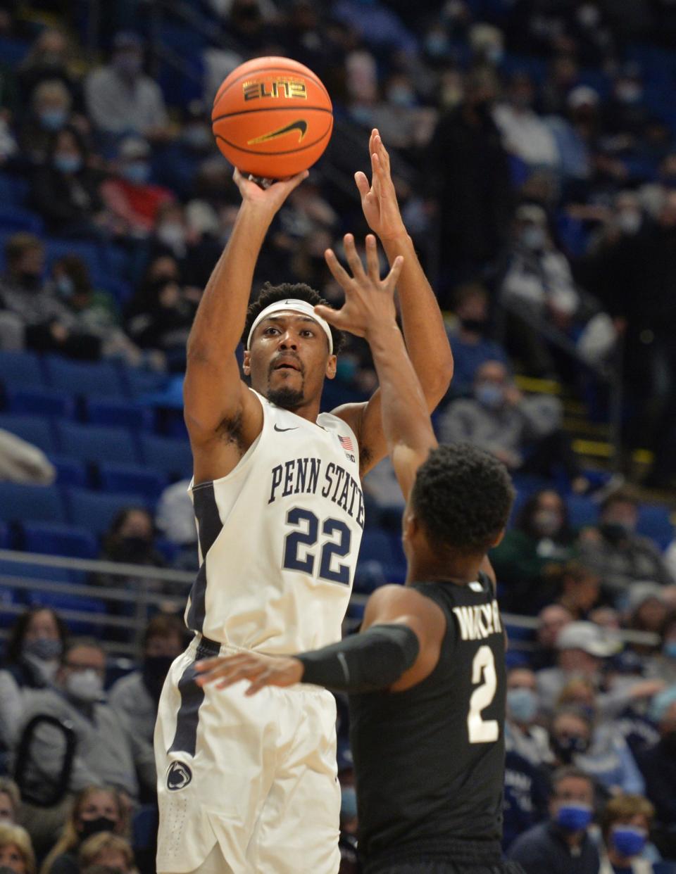 Penn State's Jalen Pickett, shooting here in last season's game against MSU in State College, is leading the Nittany Lions at 16.1 points per game.