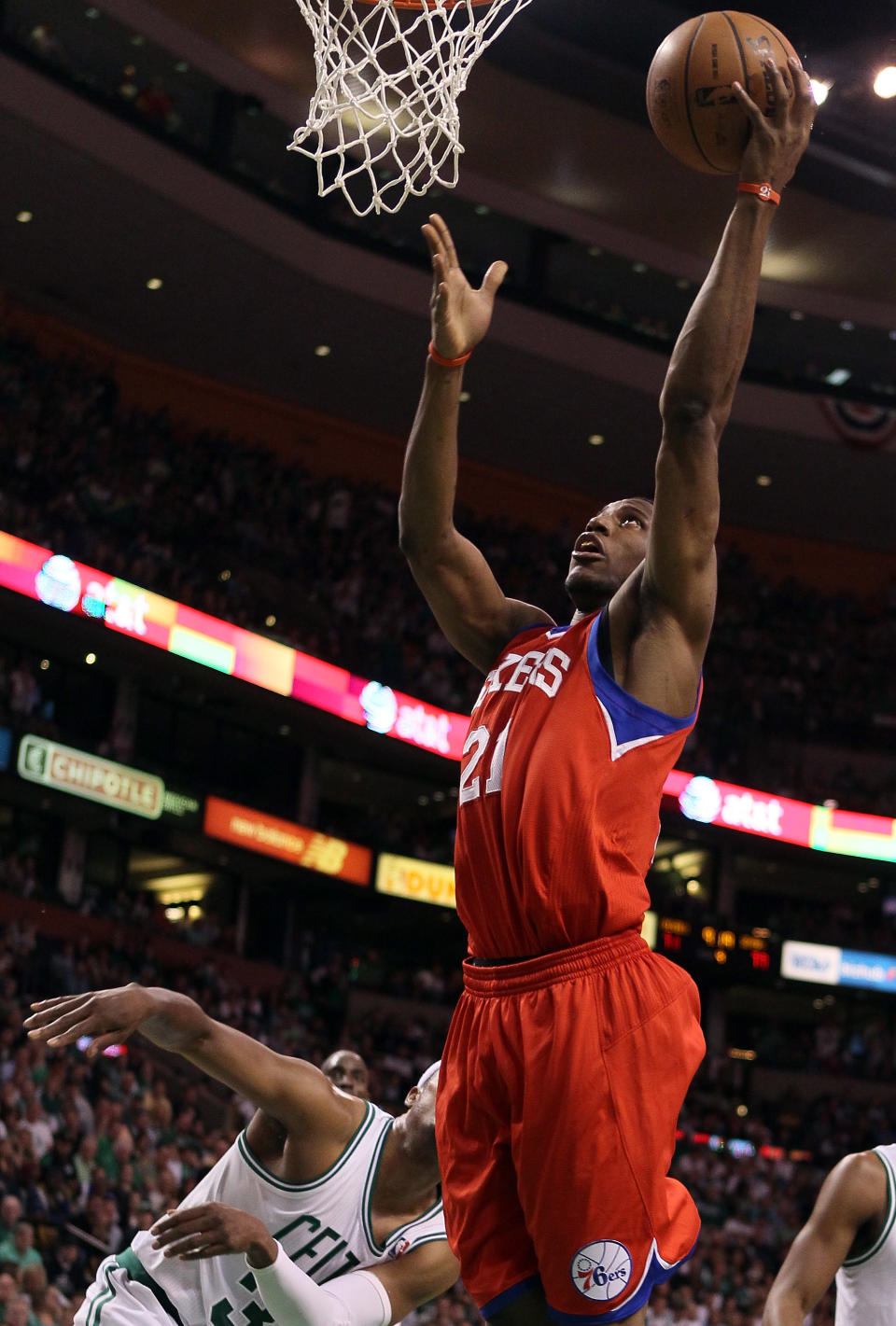 BOSTON, MA - MAY 12: Thaddeus Young #21 of the Philadelphia 76ers takes a shot as Paul Pierce #34 of the Boston Celtics defends in Game One of the Western Conference Semifinals in the 2012 NBA Playoffs on May 12, 2012 at TD Garden in Boston, Massachusetts. The Boston Celtics defeated the Philadelphia 76ers 92-91. NOTE TO USER: User expressly acknowledges and agrees that, by downloading and or using this photograph, User is consenting to the terms and conditions of the Getty Images License Agreement. (Photo by Elsa/Getty Images)