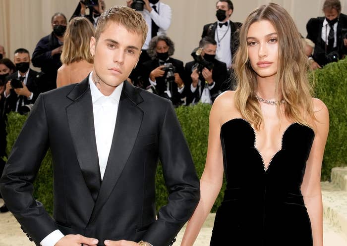 Hailey and Justin stand close together at the event