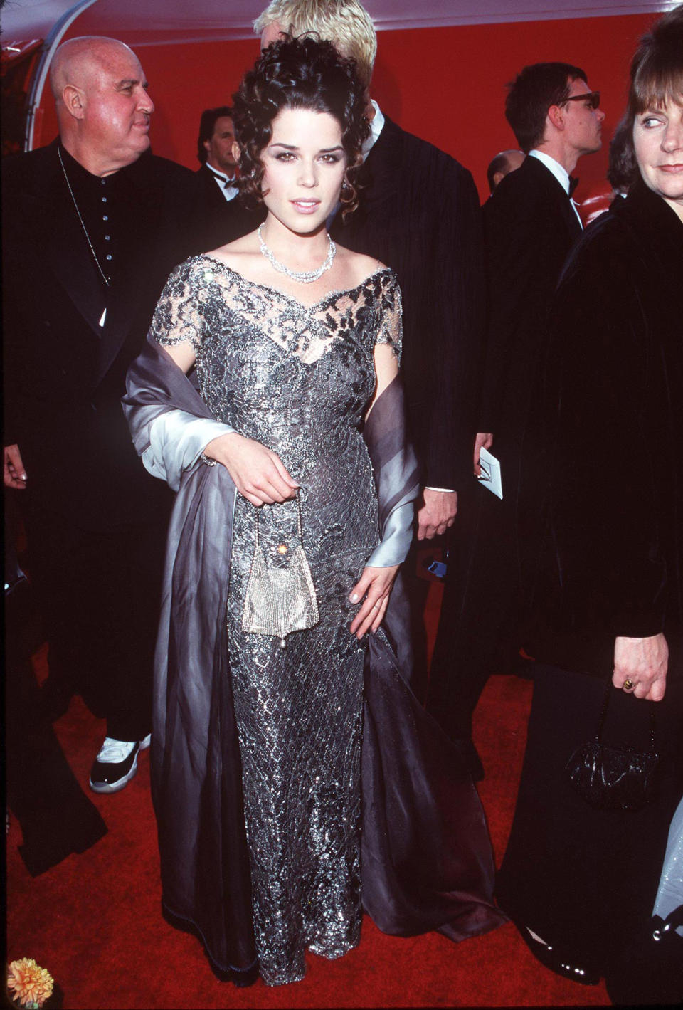 Neve Campbell in a metallic red carpet look