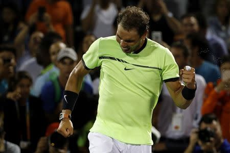 Mar 29, 2017; Miami, FL, USA; Rafael Nadal of Spain celebrates after his match against Jack Sock of the United States (not pictured) on day nine of the 2017 Miami Open at Crandon Park Tennis Center. Nadal won 6-2, 6-3. Geoff Burke-USA TODAY Sports0