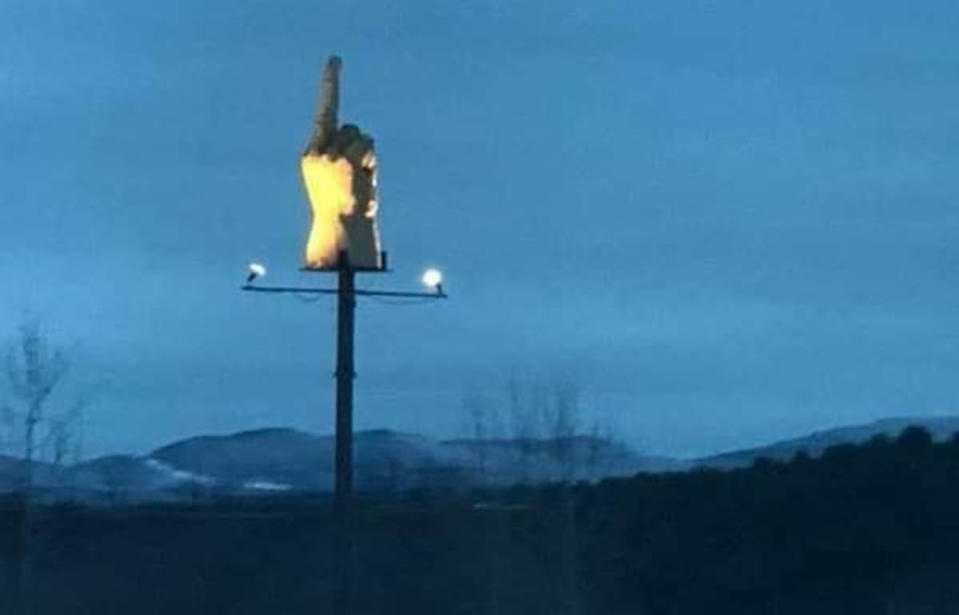 Ted Pelkey even attached two floodlights to illuminate the $5500 sculpture at night. Source: Ted Pelkey’s Middle Finger Sculpture in Westford, Vermont / Facebook