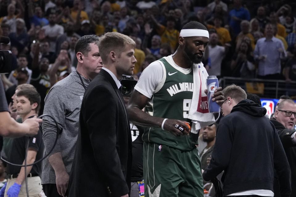 Milwaukee Bucks' Bobby Portis (9) leaves the court after being ejected during the first half of Game 4 of the first round NBA playoff basketball series against the Indiana Pacers, Sunday, April 28, 2024, in Indianapolis. (AP Photo/Michael Conroy)