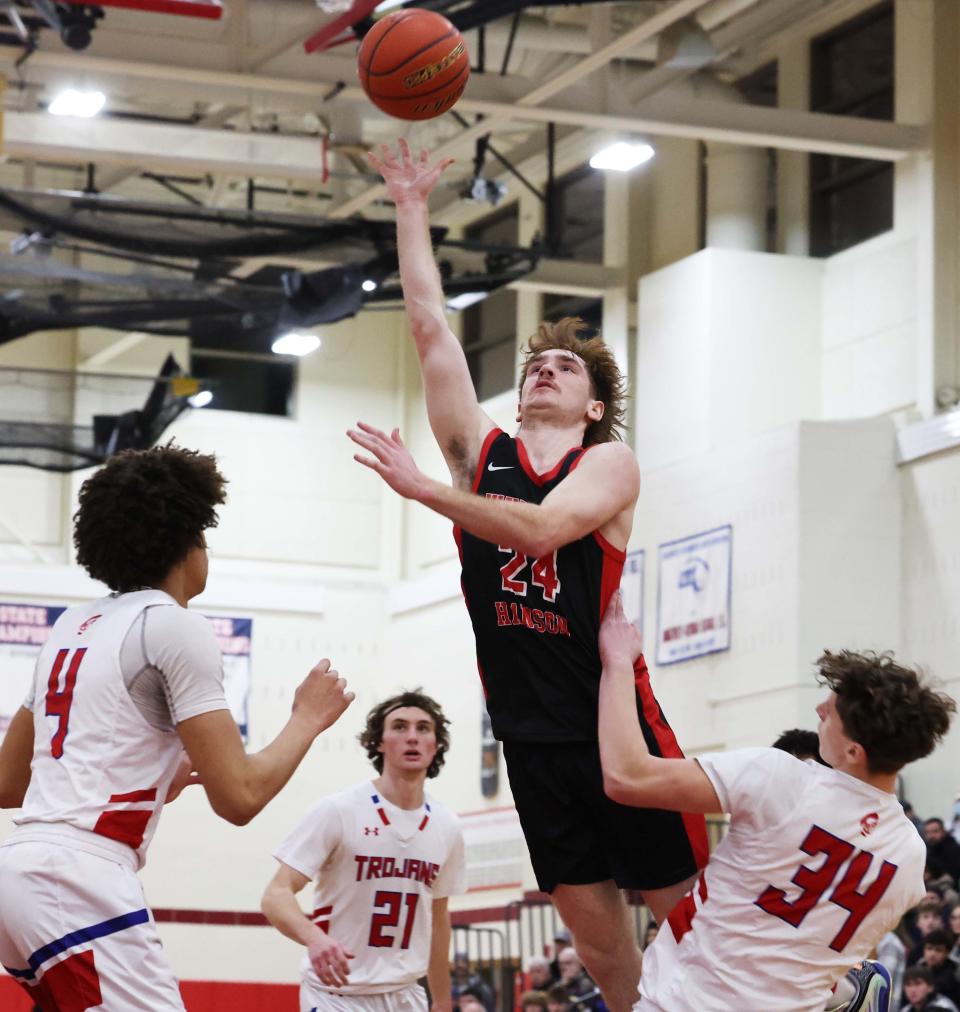 Whitman-Hanson's Evan Yakavonis goes up for a layup versus Bridgewater-Raynham during a game on Thursday, Dec. 21, 2023. Bridgewater-Raynham won the game in double overtime 75-72.