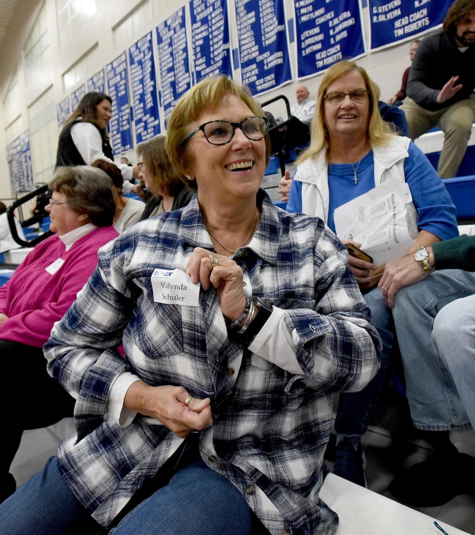 Valynda Schuler, a proud Dundee Viking, played basketball and volleyball back in 1972-73 when Title IX started. Behind is Pat Rigel and Sharon Bunce with their maiden names on their name tags.